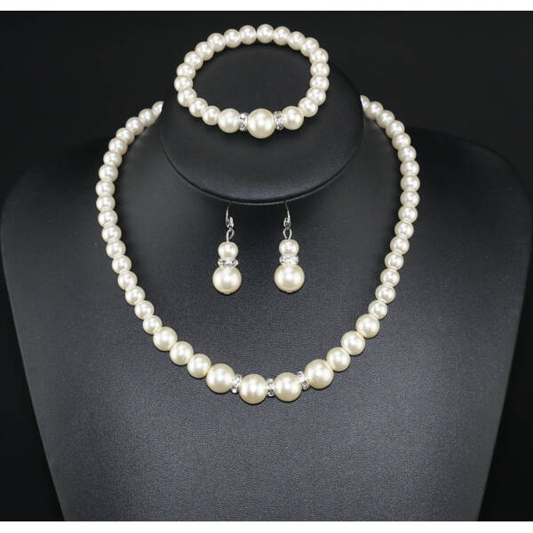 Three-piece Pearl Necklace  Bracelet  And  Earrings